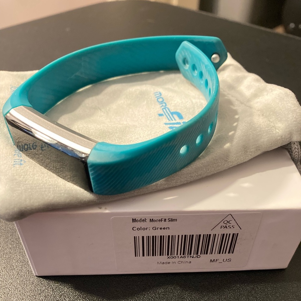 MoreFit slim tracker, teal band.